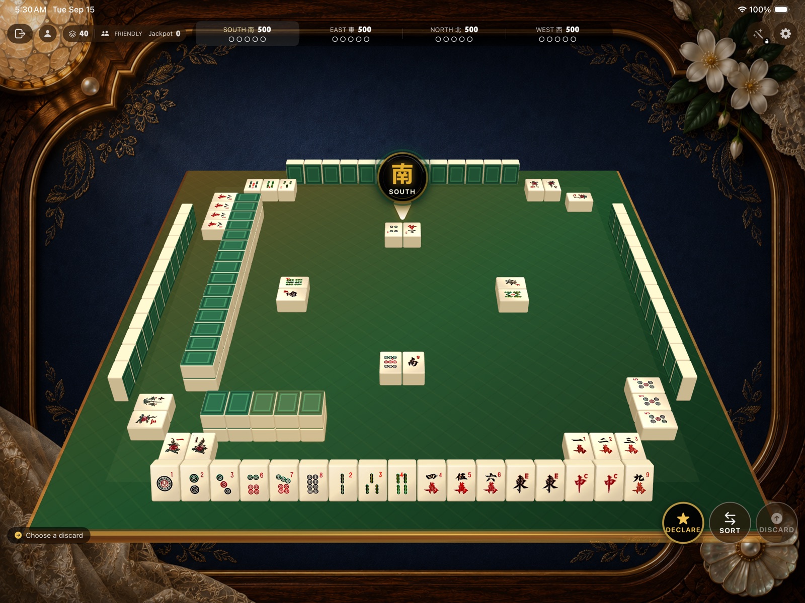 A Pinoy Mahjong table with exposed melds and flower tiles — Barong